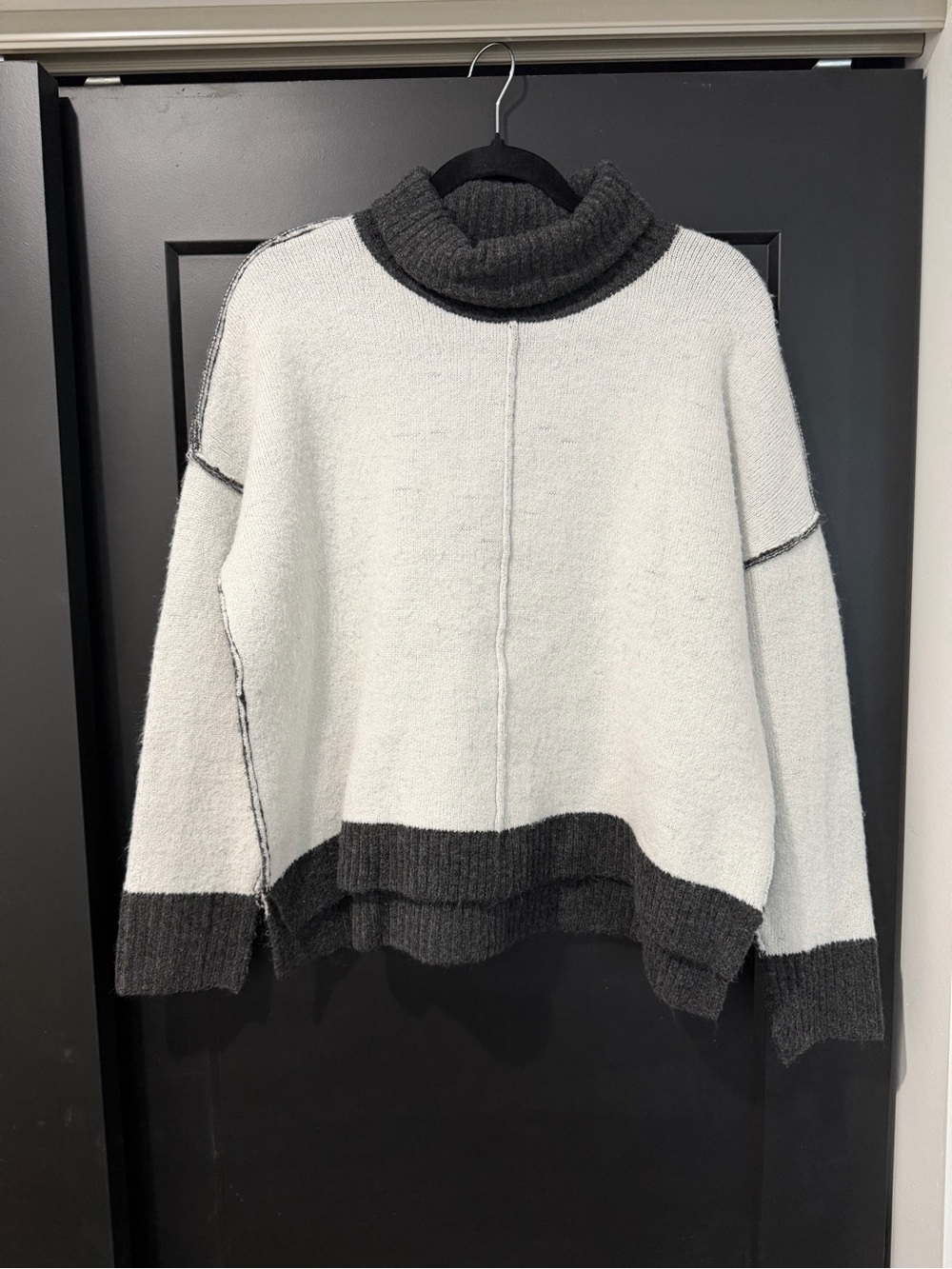 Sweet Romeo Colorblock Exposed Seam Turtleneck Sweater